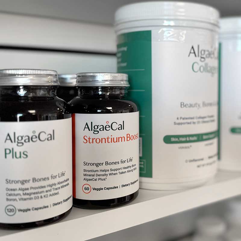 AlgaeCal supplements on shelves in bottles and jars